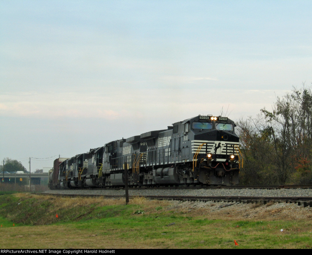 NS 9696 leads a variety of units westbound 
